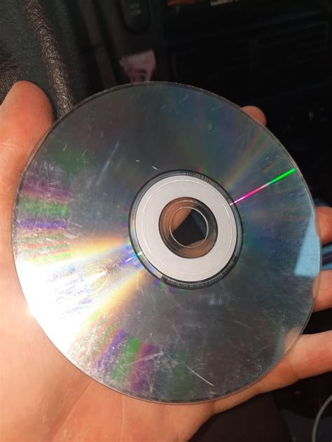 Close-up of a scratched CD