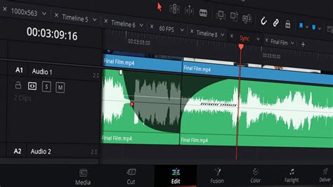 Close-up of an audio track in DaVinci Resolve showing the volume line and fade handles