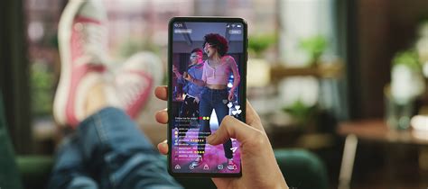 Smartphone displaying a vertical video