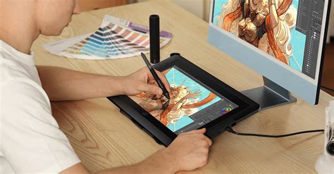 Artist using a pen display tablet