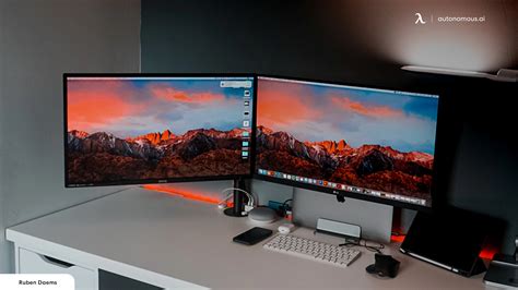 Desktop computer setup with multiple monitors for photo editing