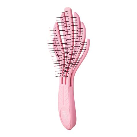 Crescent moon shape for a curly hair brush