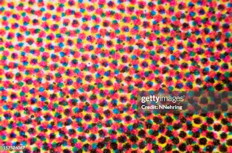 Close-up of printed dots showing CMYK color formation