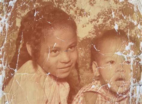 Before and after comparison of a yellowed old photograph with a corrected version