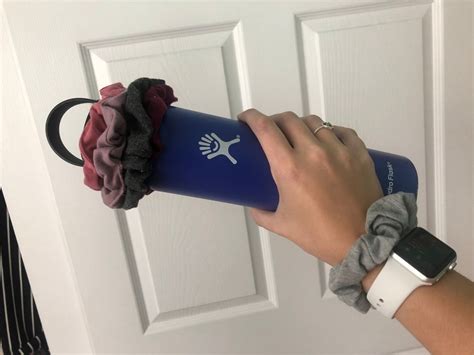 Collage of VSCO girl aesthetic items: Hydro Flask, scrunchies, Fjallraven backpack, Birkenstocks