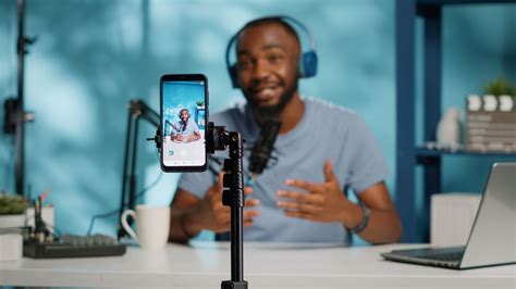 Content creators using laptops to edit videos