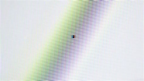 Comparison image showing a small dot on screen and a larger, spread-out dot after printing