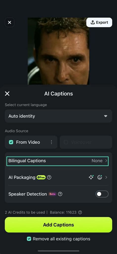 Close-up of a smartphone screen showing the Filmora App with AI captions