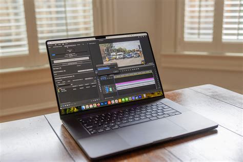 Photographer editing photos on a powerful computer