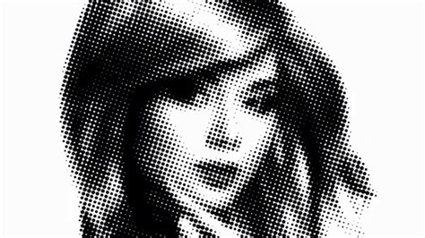 Example of a grayscale photo converted to a halftone effect in Illustrator.