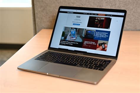 MacBook Pro with InDesign open