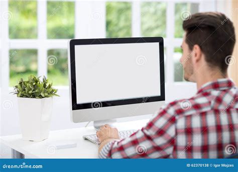 Person looking at a computer screen with Photoshop open