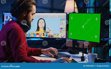 Photographer adjusting colors on a computer screen