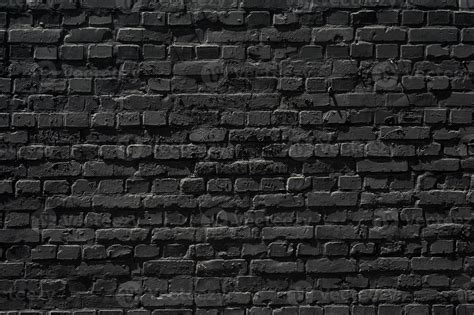 Dark brick wall texture background in Photoshop