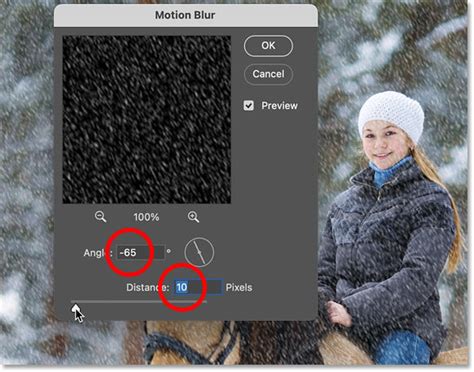 Photoshop Motion Blur Filter Dialog Box with settings for snow