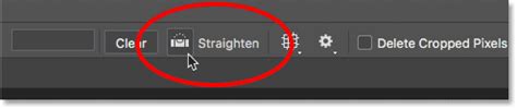 Diagram illustrating how to use the straighten tool in Photoshop
