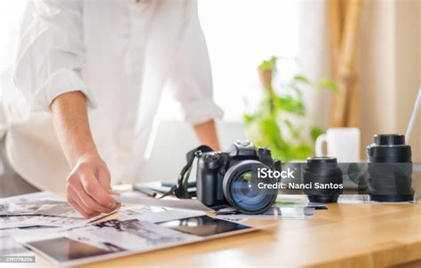Photographer selecting images for stock submission