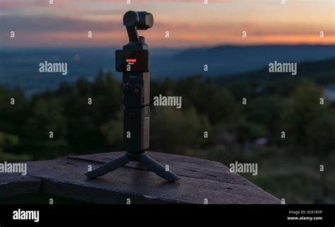 Camera on a tripod during a sunset