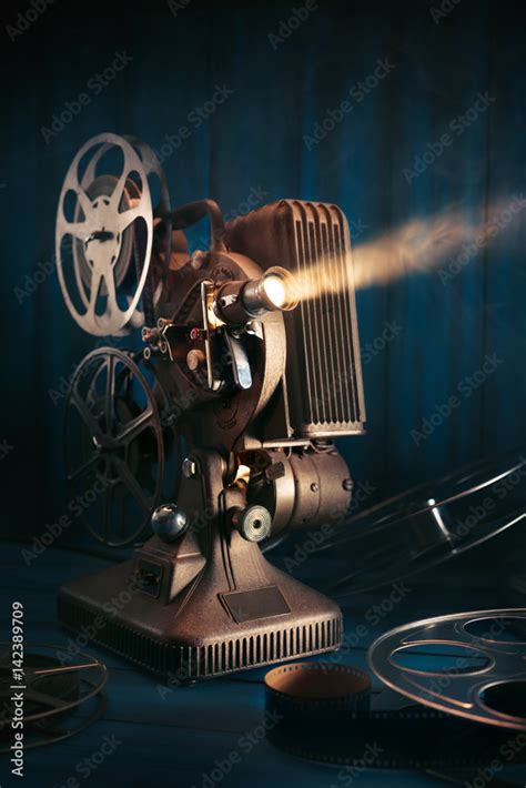 Vintage film projector with a 4:3 screen
