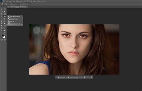 Screenshot of Fotor's red-eye removal interface with brush tool active