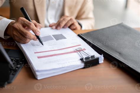 Person reviewing a document with concern