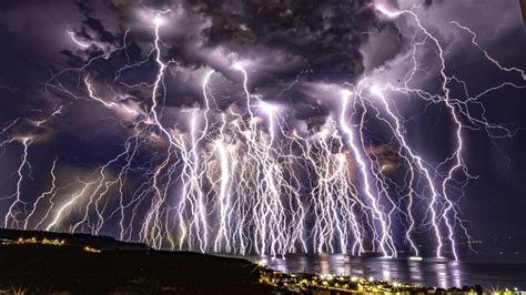 Composite image showing a lightning bolt integrated into a stormy sky
