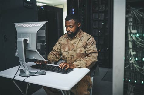 Military personnel using computers