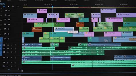 A screenshot of Kapwing's editing interface showing audio tracks and transcription
