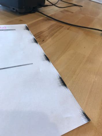 Close-up of toner smears on a photocopied paper