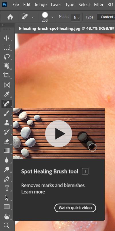 Screenshot of the Spot Healing Brush Tool selected in Photoshop's toolbar