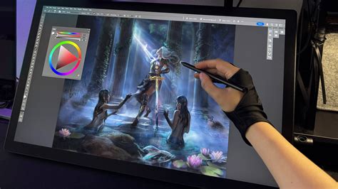Artist using a keyboard and stylus with a digital art tablet